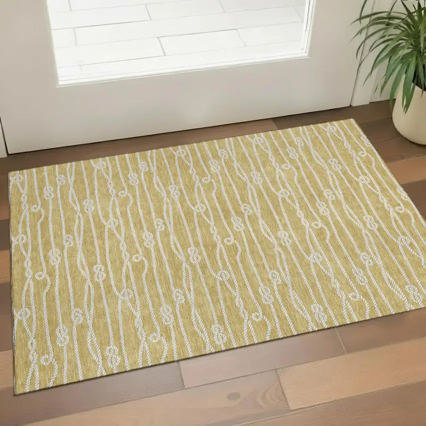 Gold And Ivory Nautical Washable Area Rug With UV Protection Photo 1