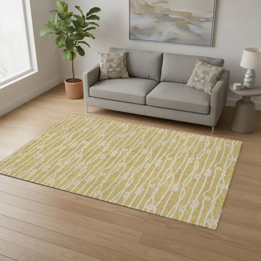 Gold And Ivory Nautical Washable Area Rug With UV Protection Photo 1