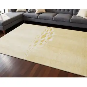 Photo of Gold And Ivory Nautical Washable Area Rug With UV Protection