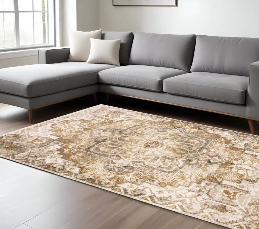 Gold And Ivory Oriental Power Loom Stain Resistant Area Rug With Fringe Photo 1