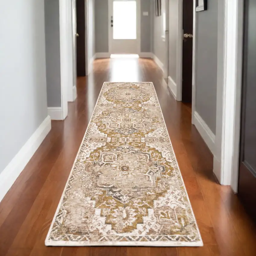2' X 8' Gold And Ivory Oriental Power Loom Stain Resistant Runner Rug With Fringe Photo 1