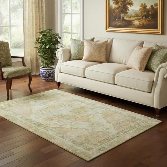 Gold And Ivory Oriental Washable Area Rug With UV Protection Photo 2