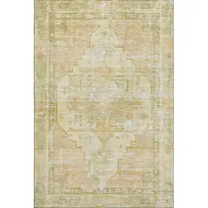Photo of Gold And Ivory Oriental Washable Area Rug With UV Protection