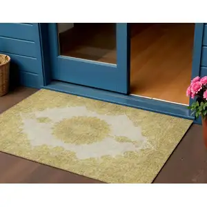 Photo of Gold And Ivory Oriental Washable Indoor Outdoor Area Rug