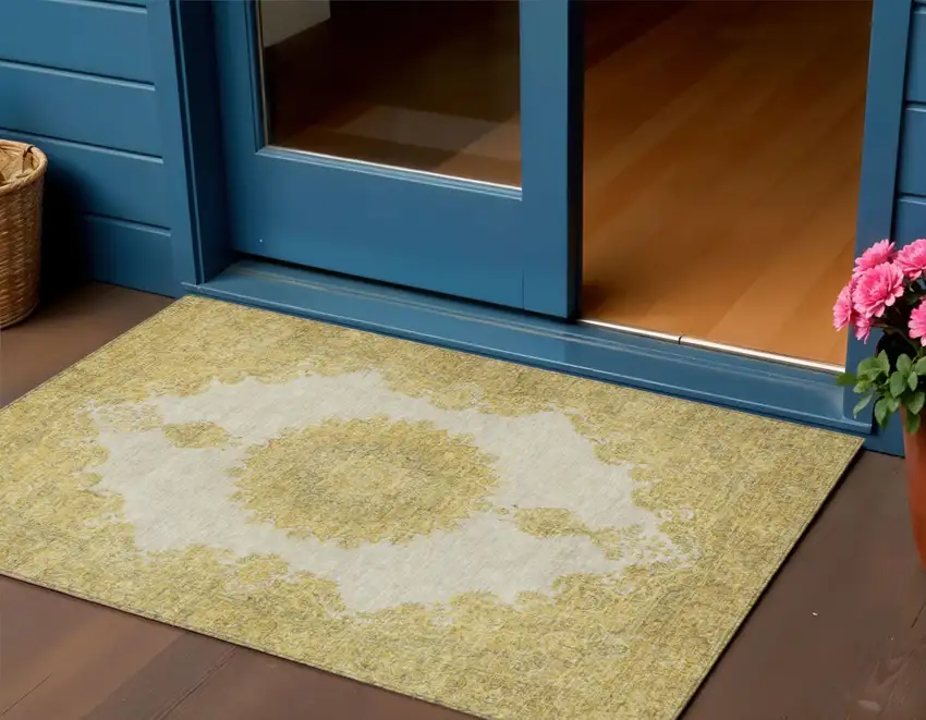 Gold And Ivory Oriental Washable Indoor Outdoor Area Rug Photo 1
