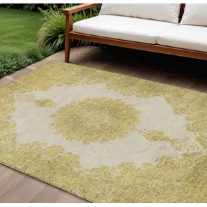 Photo of Gold And Ivory Oriental Washable Indoor Outdoor Area Rug
