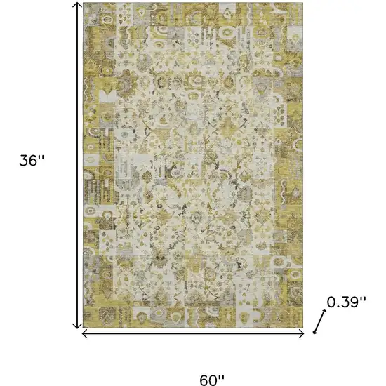 Gold And Ivory Patchwork Washable Area Rug With UV Protection Photo 9