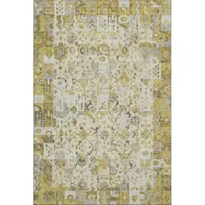 Photo of Gold And Ivory Patchwork Washable Area Rug With UV Protection