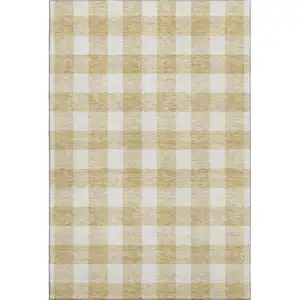Photo of Gold And Ivory Plaid Washable Area Rug With UV Protection