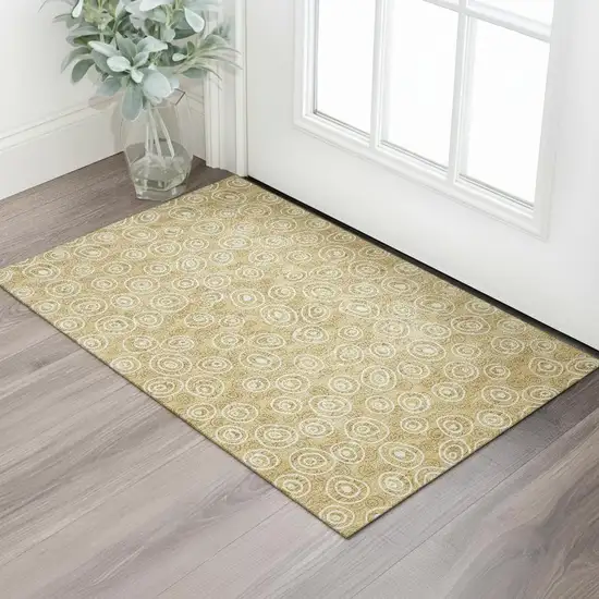 Gold And Ivory Polka Dot Washable Area Rug With UV Protection Photo 1