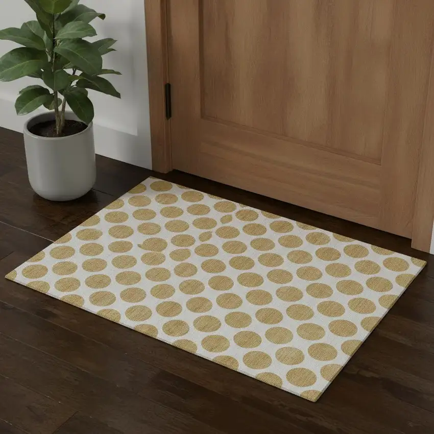 Gold And Ivory Polka Dot Washable Area Rug With UV Protection Photo 1