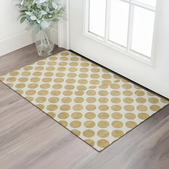 Gold And Ivory Polka Dot Washable Area Rug With UV Protection Photo 2