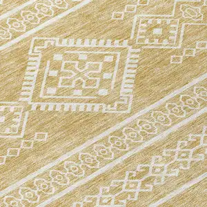 Photo of Gold And Ivory Southwestern Washable Indoor Outdoor Area Rug