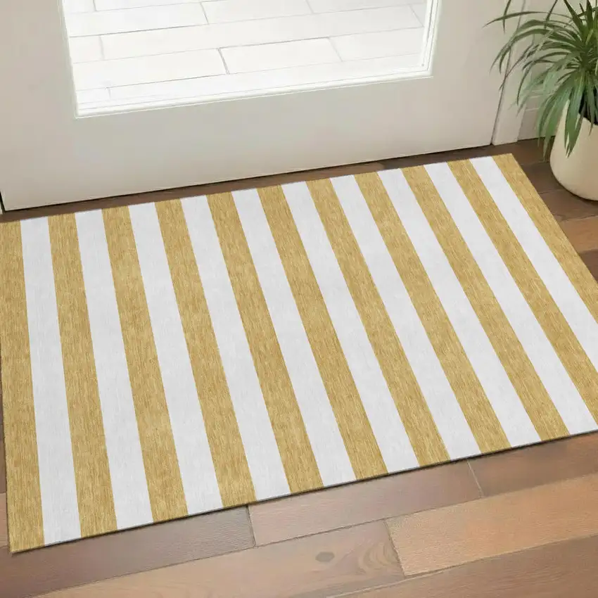 Gold And Ivory Striped Washable Area Rug With UV Protection Photo 1