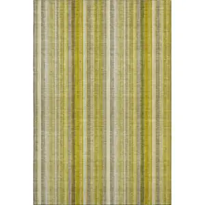 Photo of Gold And Ivory Striped Washable Area Rug With UV Protection