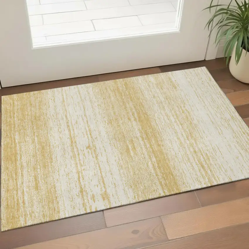 Gold And Ivory Striped Washable Area Rug With UV Protection Photo 1