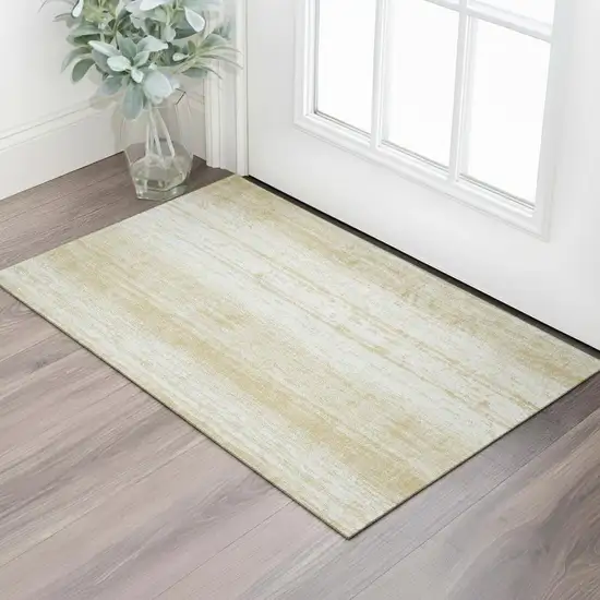Gold And Ivory Striped Washable Area Rug With UV Protection Photo 1
