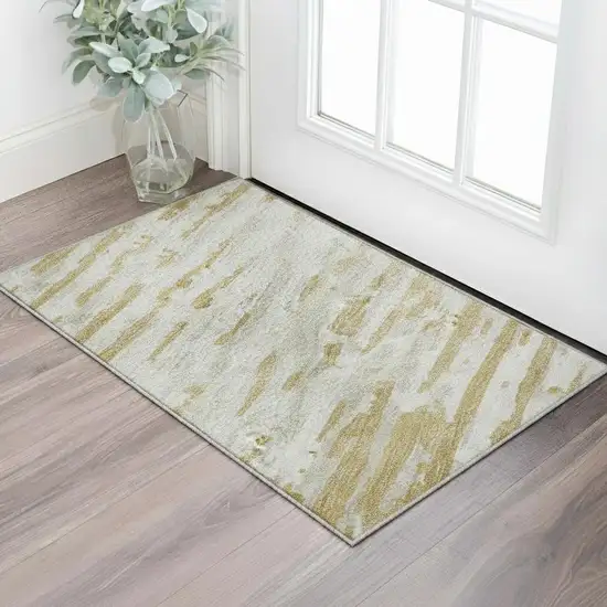 Gold And Ivory Striped Washable Area Rug With UV Protection Photo 2