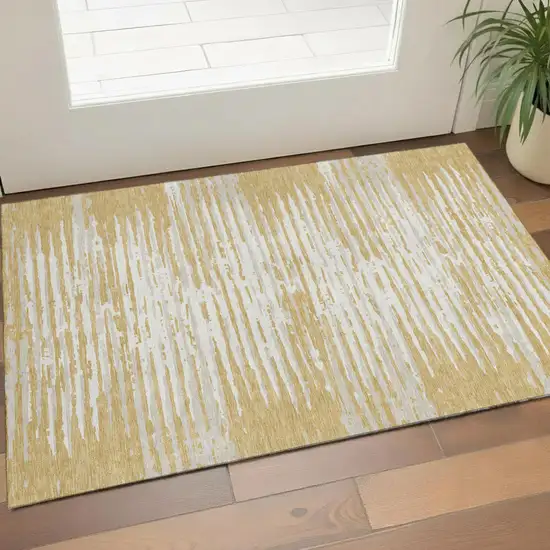 Gold And Ivory Striped Washable Area Rug With UV Protection Photo 1