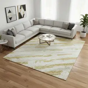 Photo of Gold And Ivory Striped Washable Area Rug With UV Protection