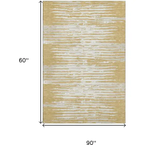 Gold And Ivory Striped Washable Area Rug With UV Protection Photo 8