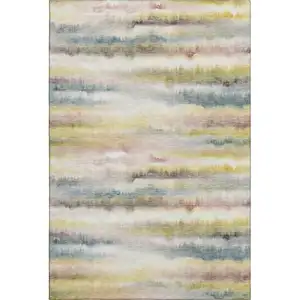 Photo of Gold And Ivory Striped Washable Area Rug With UV Protection