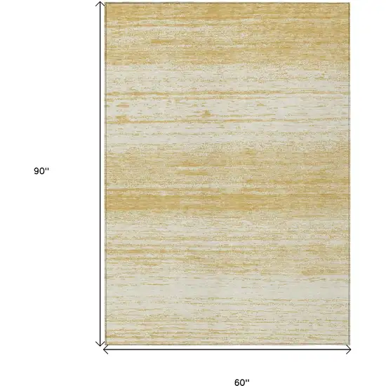 Gold And Ivory Striped Washable Indoor Outdoor Area Rug Photo 3