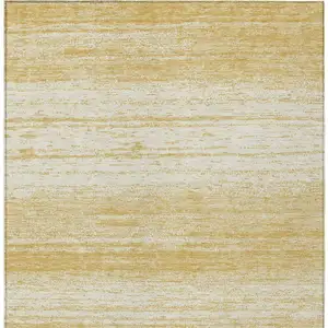 Photo of Gold And Ivory Striped Washable Indoor Outdoor Area Rug