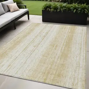 Photo of Gold And Ivory Striped Washable Indoor Outdoor Area Rug
