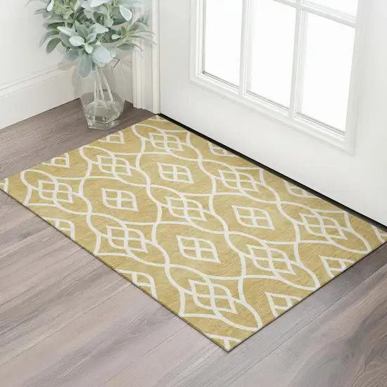 Gold And Ivory Trellis Washable Area Rug With UV Protection Photo 1