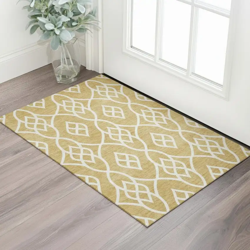 Gold And Ivory Trellis Washable Area Rug With UV Protection Photo 1