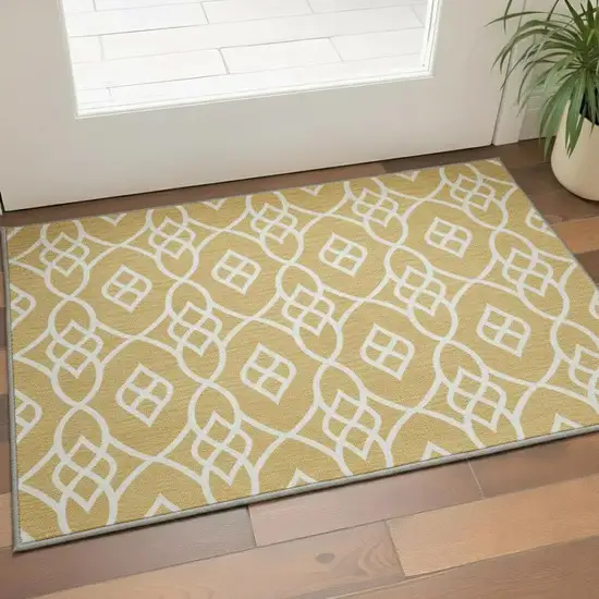 Gold And Ivory Trellis Washable Area Rug With UV Protection Photo 2