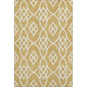 Photo of Gold And Ivory Trellis Washable Area Rug With UV Protection