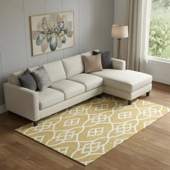 Gold And Ivory Trellis Washable Area Rug With UV Protection Photo 1