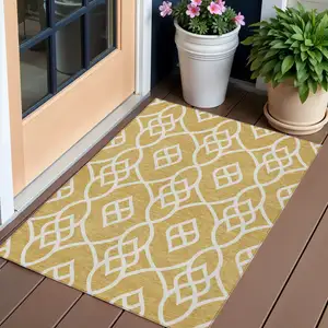 Photo of Gold And Ivory Trellis Washable Indoor Outdoor Area Rug