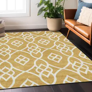 Photo of Gold And Ivory Trellis Washable Indoor Outdoor Area Rug
