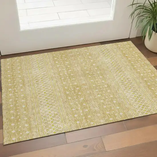 Gold And Ivory Tribal Washable Area Rug With UV Protection Photo 1