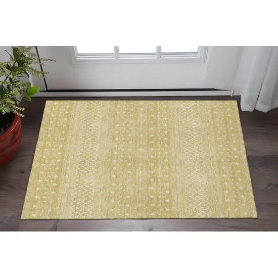 Gold And Ivory Tribal Washable Area Rug With UV Protection Photo 2