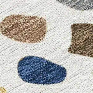 Photo of Gold And Ivory Tribal Washable Indoor Outdoor Area Rug