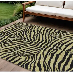 Photo of Gold And Ivory Zebra Print Washable Indoor Outdoor Area Rug