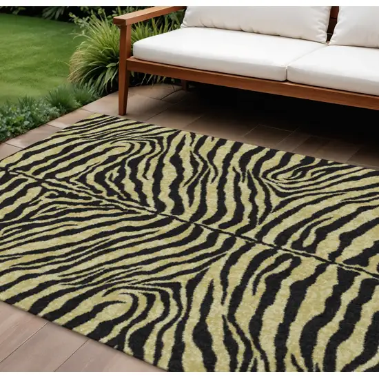 Gold And Ivory Zebra Print Washable Indoor Outdoor Area Rug Photo 1