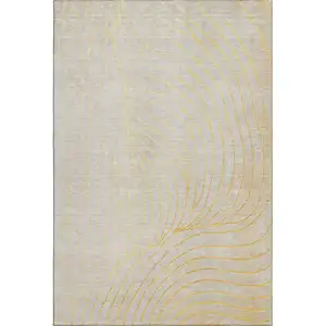 Photo of Gold And Silver Abstract Washable Area Rug With UV Protection