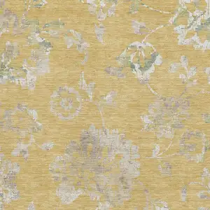 Photo of Gold And Silver Floral Washable Area Rug With UV Protection