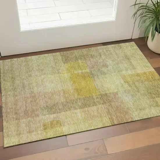 Gold And Wheat Abstract Washable Area Rug With UV Protection Photo 1