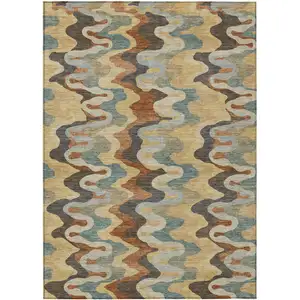 Photo of Gold And Wheat Abstract Washable Indoor Outdoor Area Rug