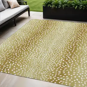 Photo of Gold And White Animal Print Washable Indoor Outdoor Area Rug