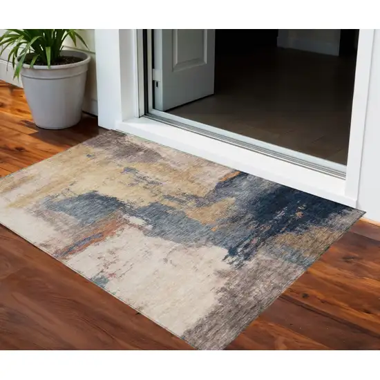 Gold Beige And Blue Abstract Washable Indoor Outdoor Area Rug Photo 1
