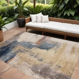 Photo of Gold Beige And Blue Abstract Washable Indoor Outdoor Area Rug
