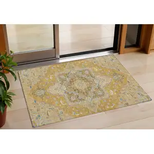 Photo of Gold Beige And Blue Oriental Washable Indoor Outdoor Area Rug