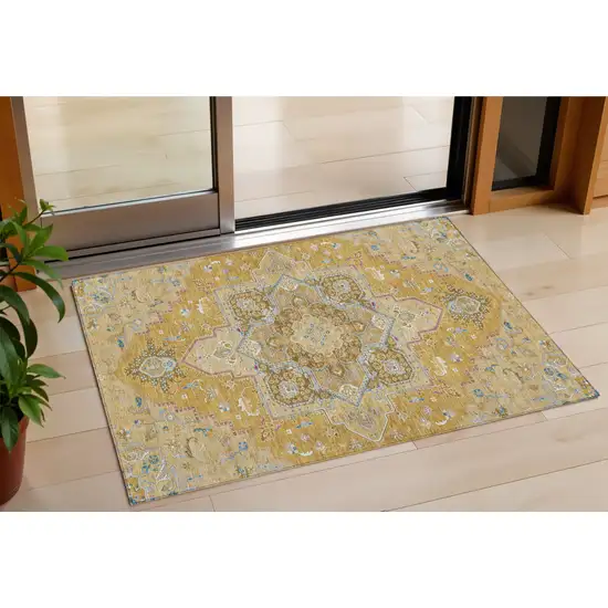 Gold Beige And Blue Oriental Washable Indoor Outdoor Area Rug Photo 1